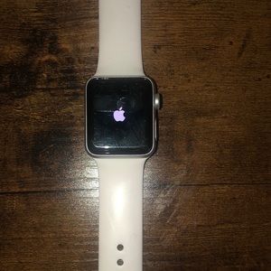 Its unlocked used and comes with charging and band